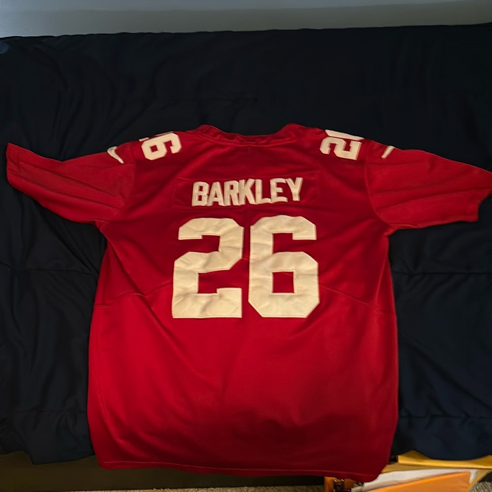 A Men’s Medium New York Giant “Color Rush-Red:from TNF a few years ago.”